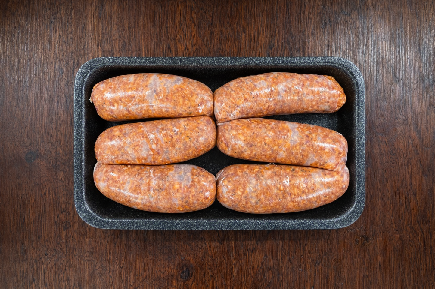 lamb merguez sausages on tray