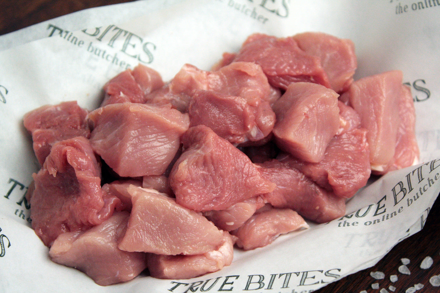 diced pork displayed on true bites greaseproof paper