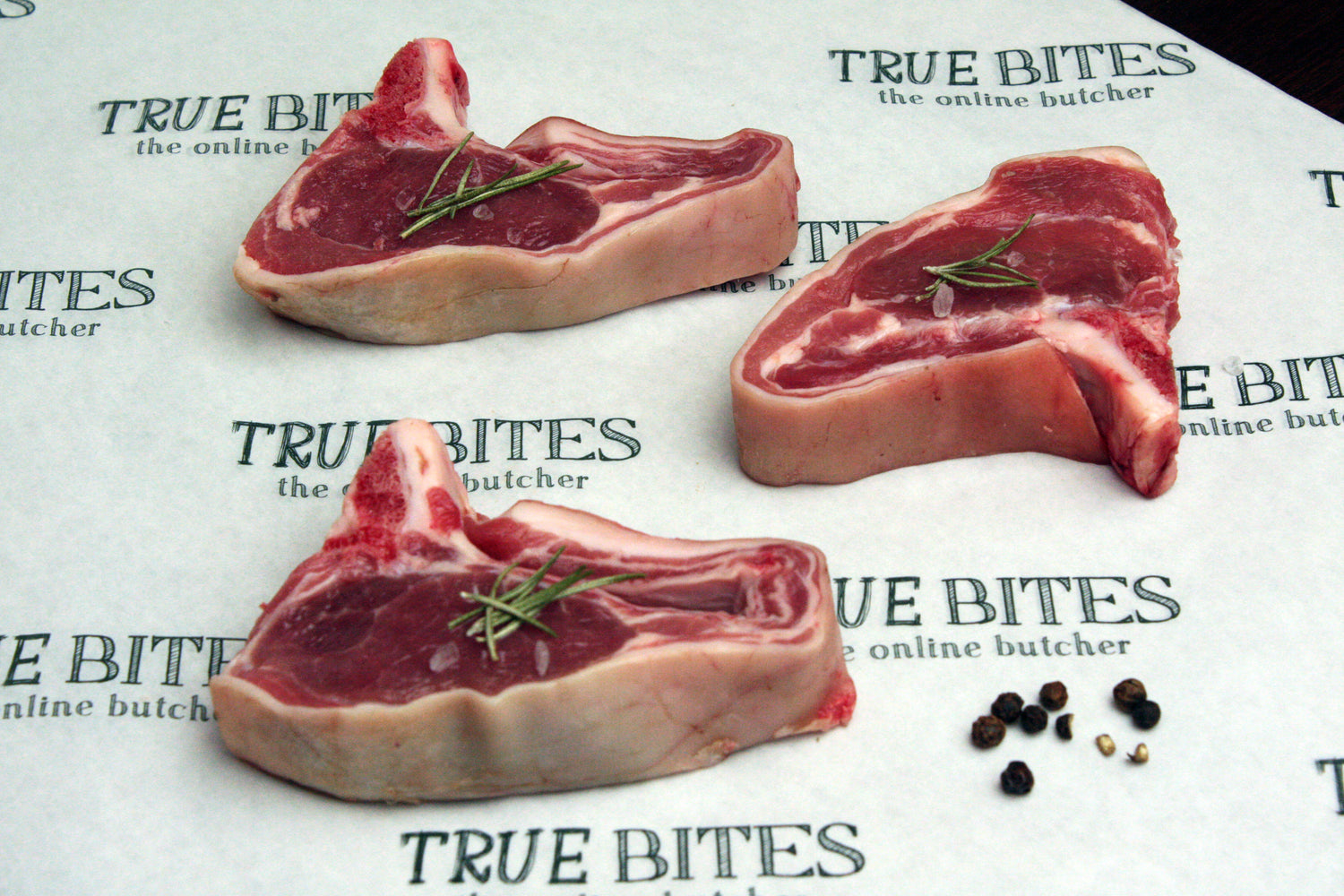lamb loin chops pictured on true bites branded greaseproof paper 