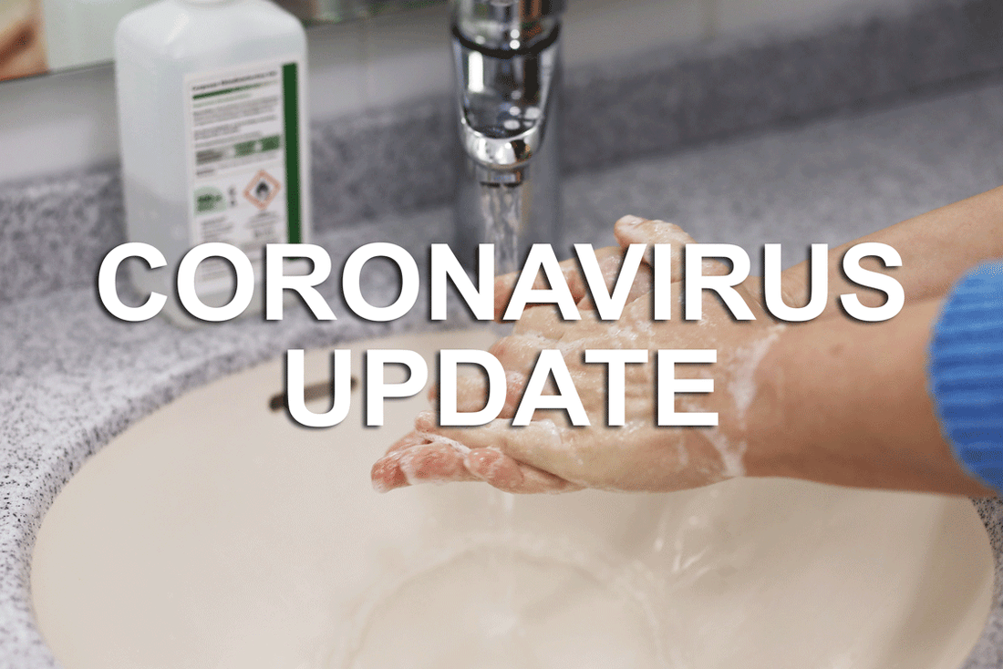 washing hands with text reading 'coronavirus update' overlaid