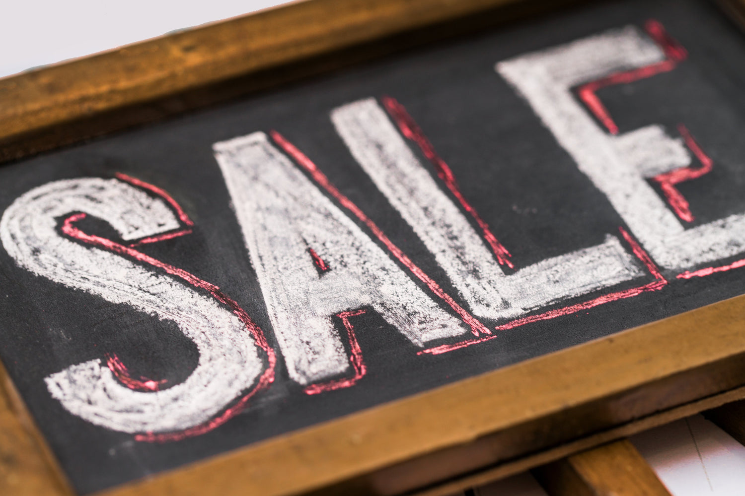 Sale in bold red writing on a white background