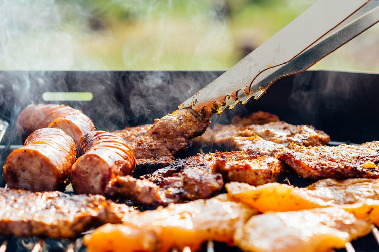 bbq meat being grilled on a bbq
