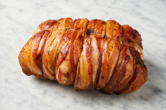 roasted turkey butterfly wrapped in streaky bacon 