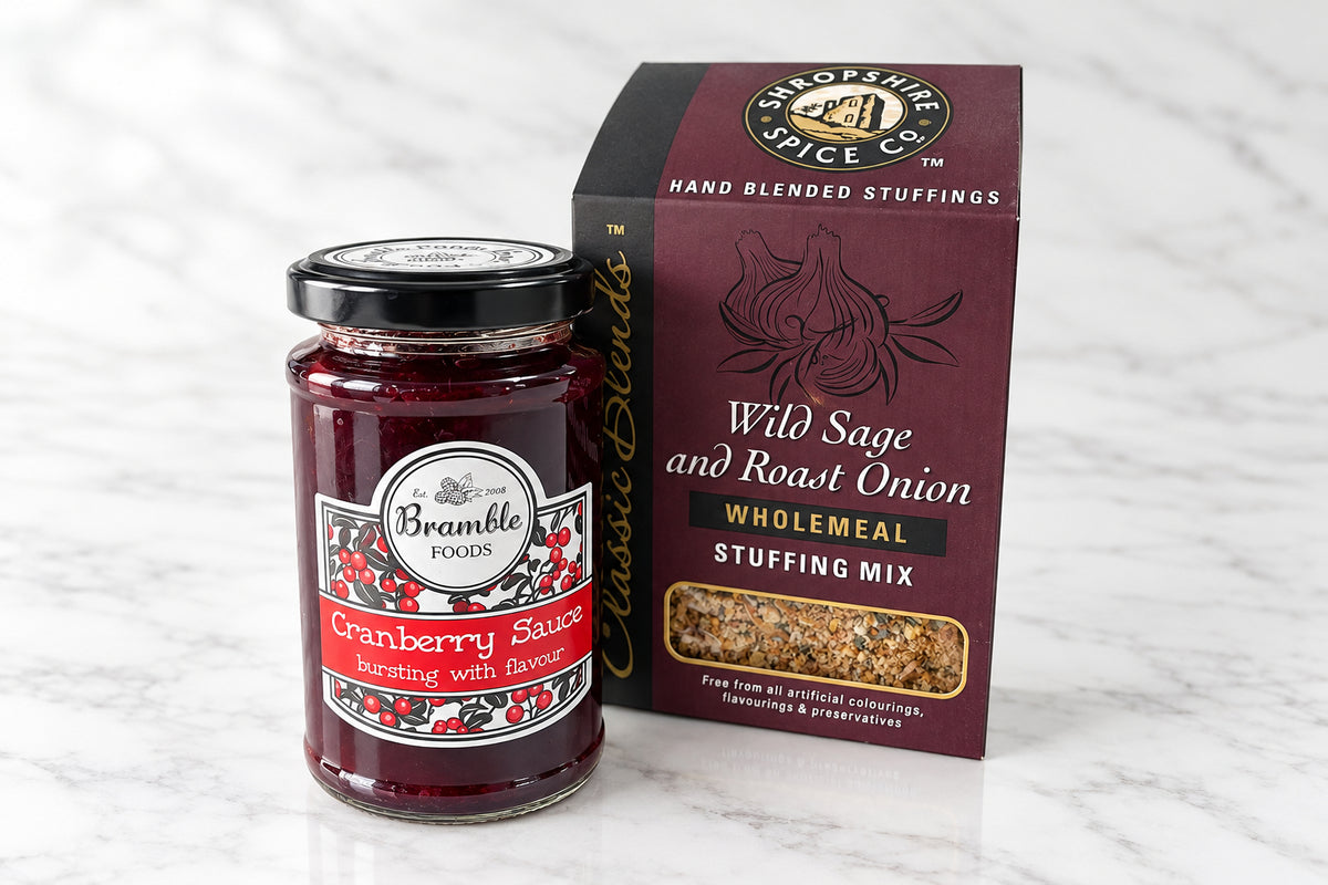 a jar of cranberry sauce and a box of wild sage and roast onion wholemeal stuffing