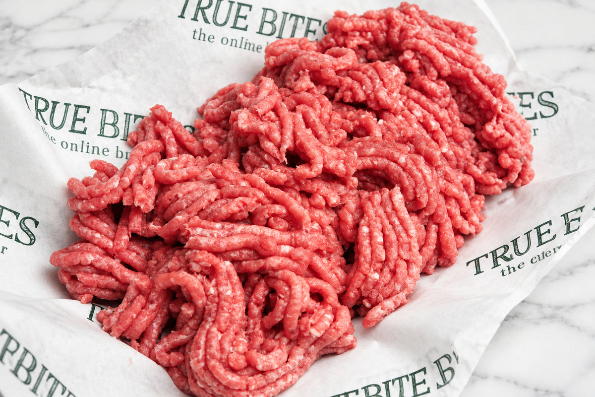 minced lamb on branded true bites butcher paper