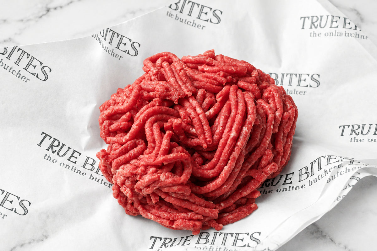 raw lean beef mince on branded true bites butcher paper