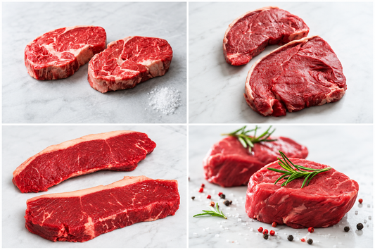 2 ribeye steaks, 2 sirloin steaks, 2 fillet steaks, and 2 rump steaks on marble surface