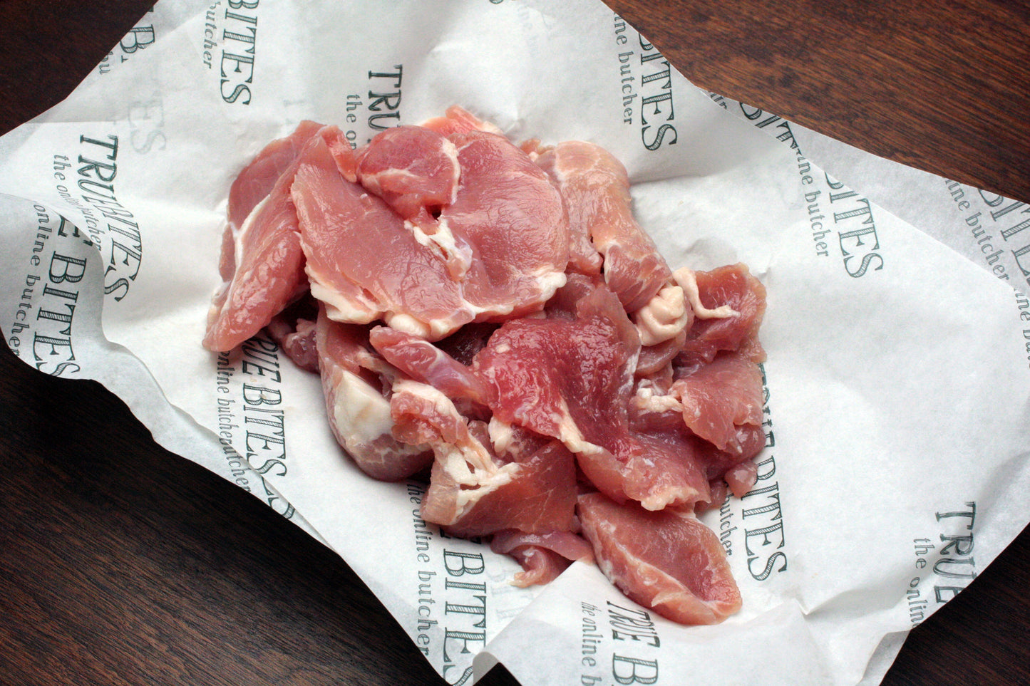 bacon misshapes displayed on branded true bites greaseproof paper