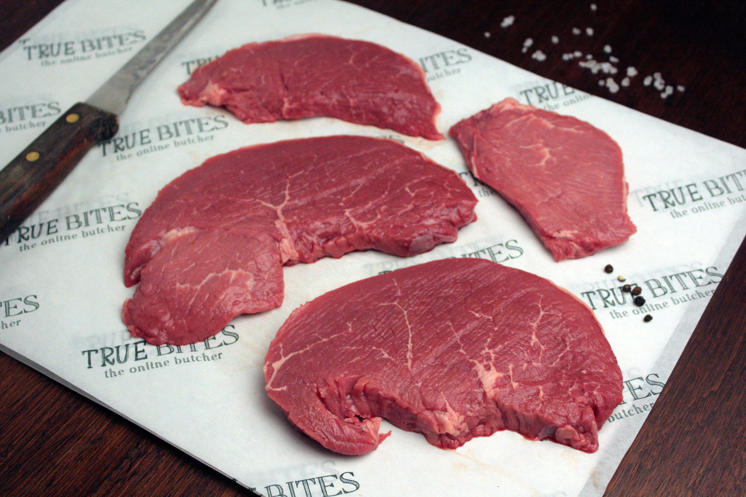 beef braising steak displayed on true bites greaseproof paper