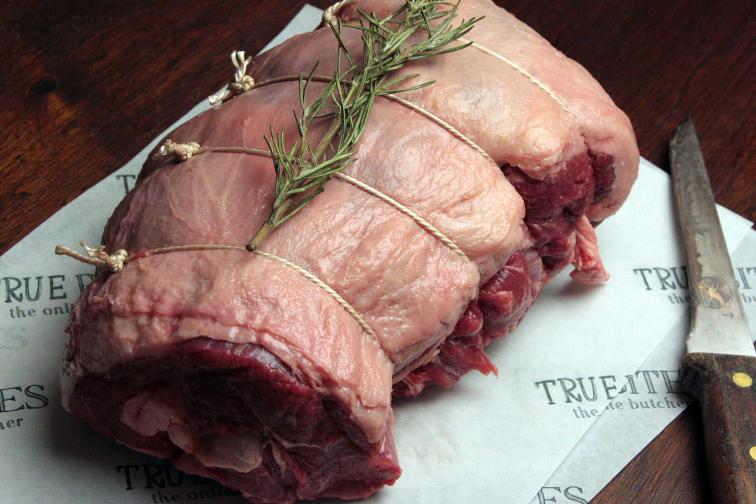 boneless lamb leg on true bites greaseproof paper