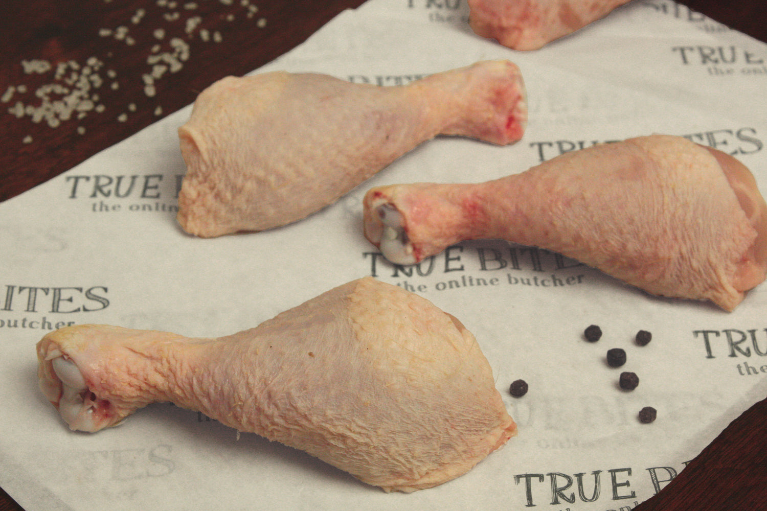 chicken drumsticks on true bites greaseproof paper