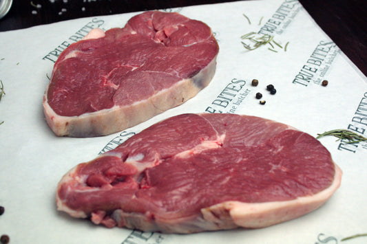 lamb leg steaks on true bites greaseproof paper