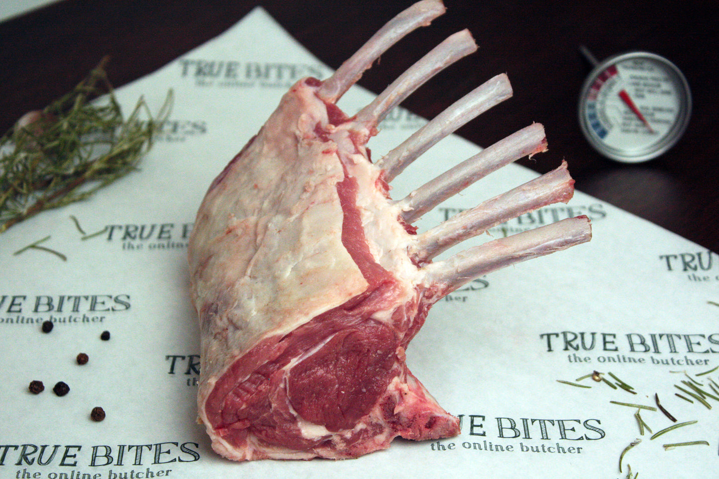 french trimmed lamb rack pictured on true bites branded greaseproof paper 