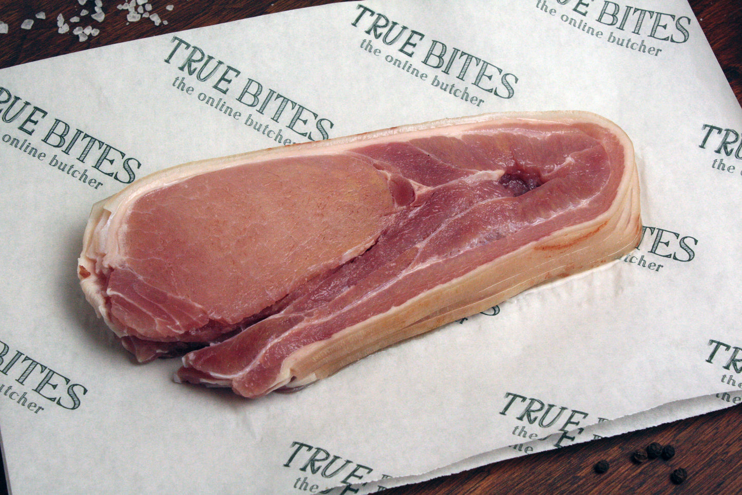 rasher of middle bacon displayed on true bites branded greaseproof paper