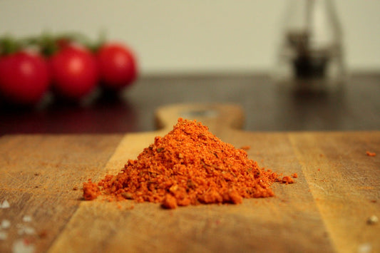 hot and spicy marinade in a heap on a wooden board