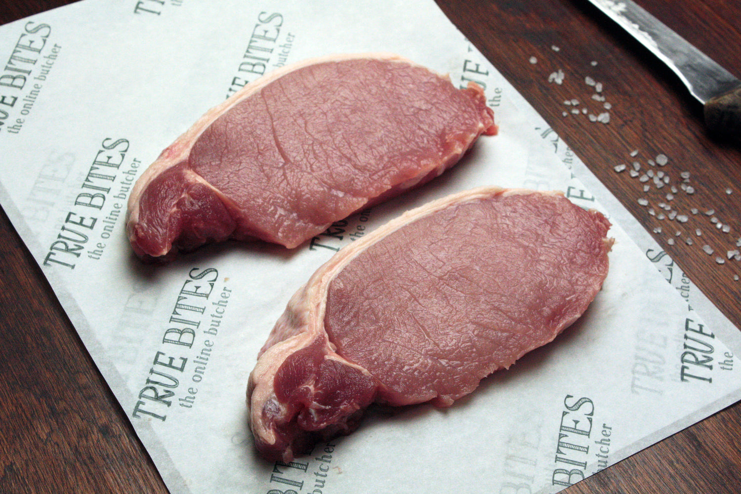 pork loin steaks on true bites greaseproof paper